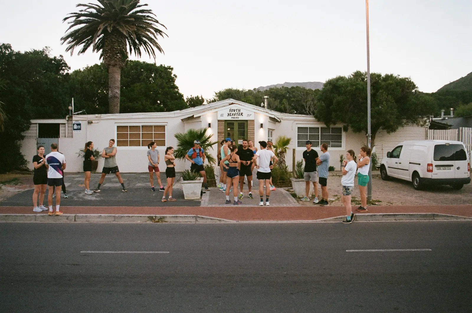Leopards runners gathered outside South Yeaster Bakery before a dawn run